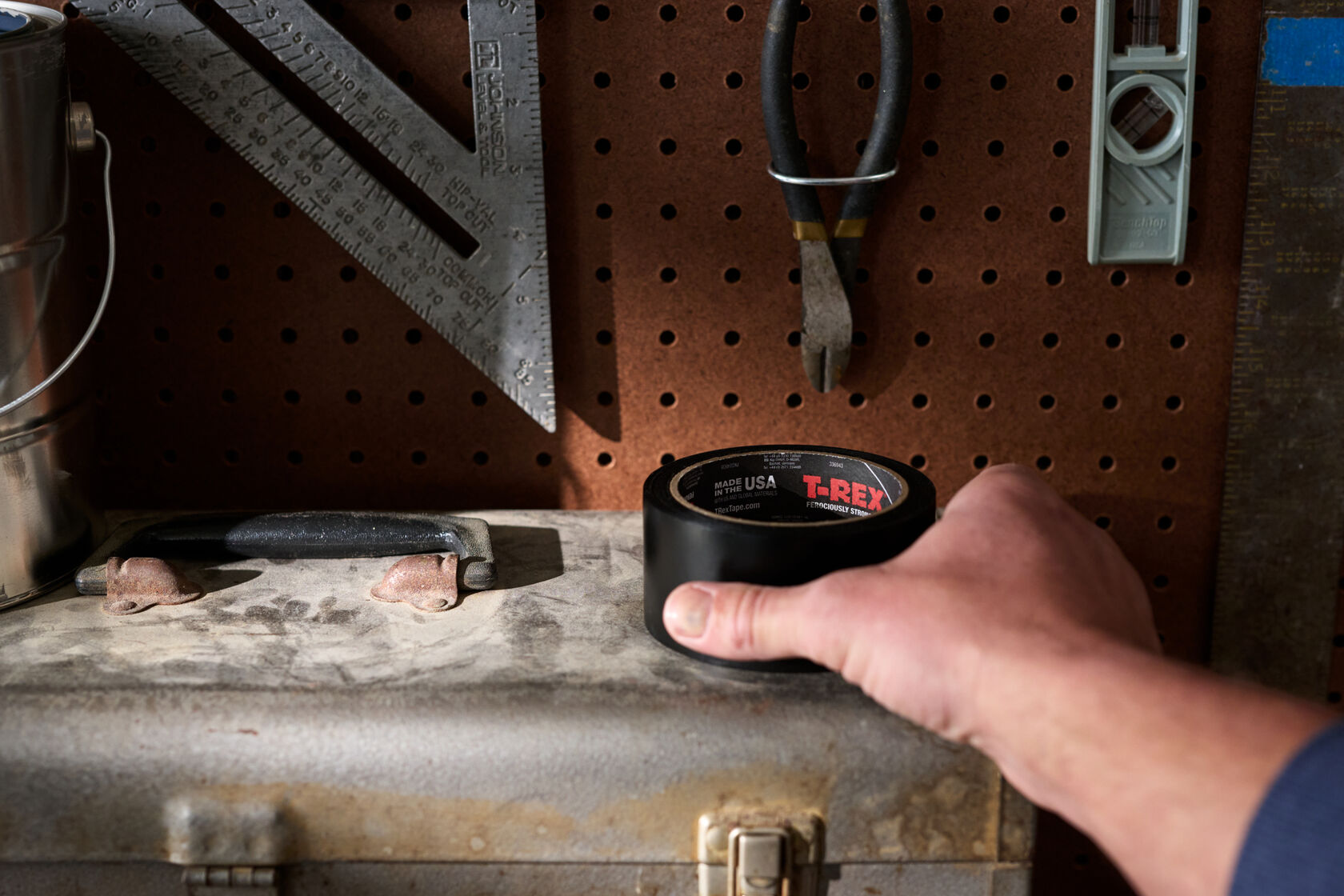 A roll of Black T-Rex Waterproof and Repair Tape on a Toolbox
